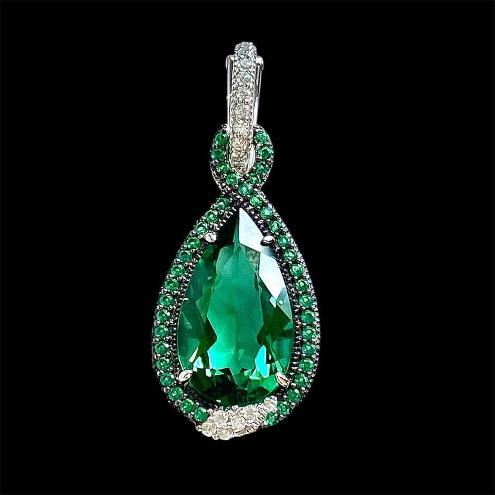 Judith Ripka pendant with green faceted stone and cz’s
